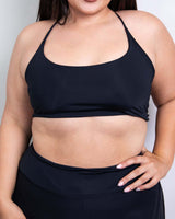 Model showcasing the Matte Black Lush top, perfect for rave outfits and stylish summer looks.