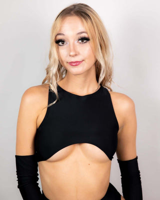 Model wearing a Matte Black Teaser Top, showcasing the stylish underboob design, perfect for rave outfits.