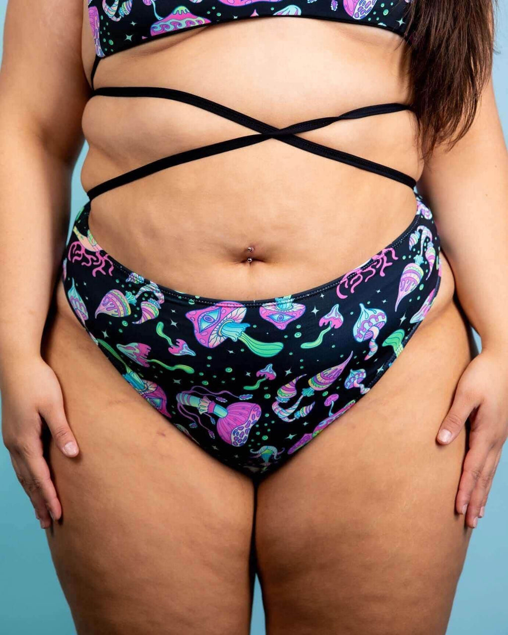 High-waisted bikini bottom featuring colorful jellyfish print, perfect for rave outfits and summer fun.