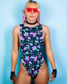 Model showcasing the Mushies Sideboob Bodysuit with psychedelic design, perfect for rave outfits and EDM festivals.
