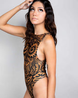 Model showcasing the Primal Sideboob Bodysuit with intricate patterns, perfect for rave outfits and festival vibes.