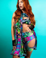 Model wearing a vibrant prismatic festival scarf with colorful rave outfit, perfect for music festivals and summer events.