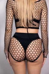 Black fishnet two-piece set featuring a long sleeve top and high-waisted shorts, perfect for rave outfits.