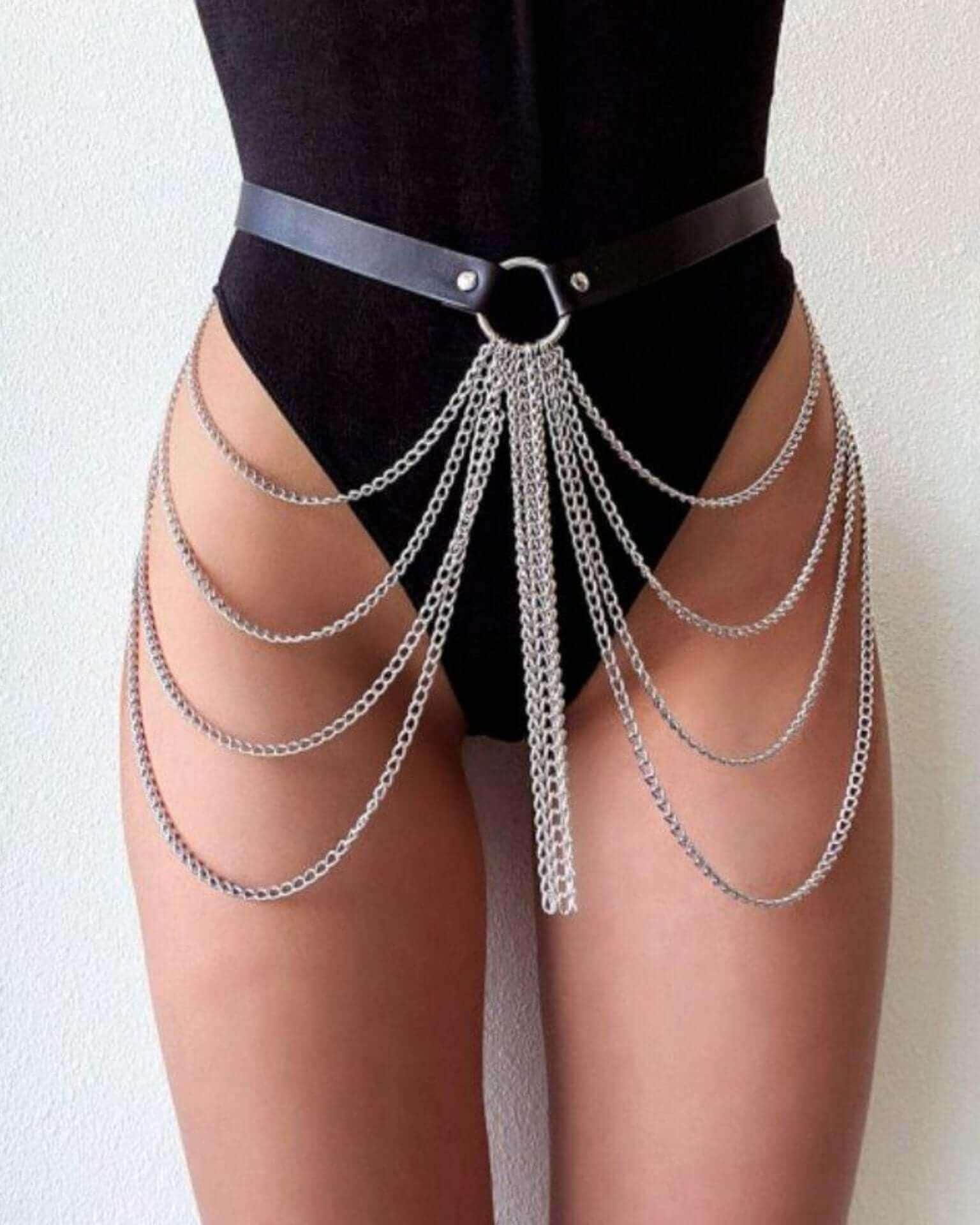 Bad B*tch Body Chain with silver chains over black rave bodysuit - festival harness accessory front view