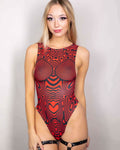 Model in a red sideboob bodysuit with abstract pattern, styled for rave outfits and comfort.