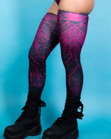 Pink Singularity Leg Sleeves with circuit design, perfect for rave outfits, featuring a thigh-high fit and soft, stretchy fabric.