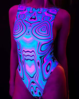 Colorful blacklight reactive bodysuit featuring unique swirling patterns, ideal for rave outfits and nighttime events.