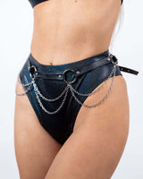 Model showcasing the Sweet Love Chain Belt with faux leather and chain detailing, perfect for rave outfits.