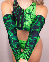 Stylish green toxic arm sleeves paired with a matching crop top, perfect for rave outfits and dance events.